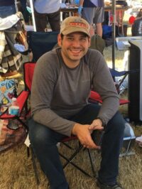 Michael Joseph, the Q Master, is still smiling after tending Q all night long